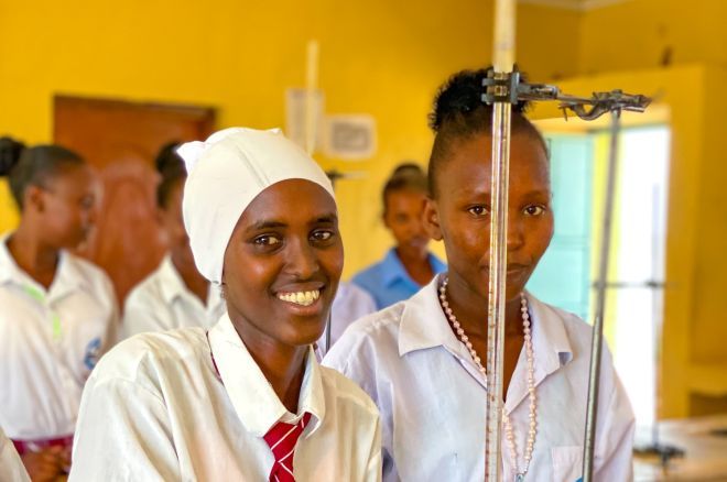 Bati (16), with her classmates in the science lab at Kalacha Nomadic Girls School in Kenya.