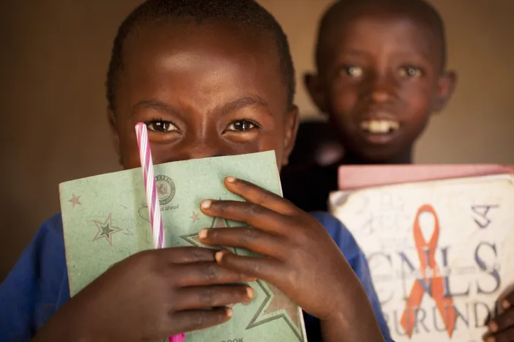 Ghyslaine Iteriteka is now going to school equipped with books and pens thanks to Concern. Photo: Abbie Trayler-Smith / Concern Worldwide. Ghyslaine Iteriteka is now going to school equipped with books and pens thanks to Concern. Photo: Abbie Trayler-Smith / Concern Worldwide.
