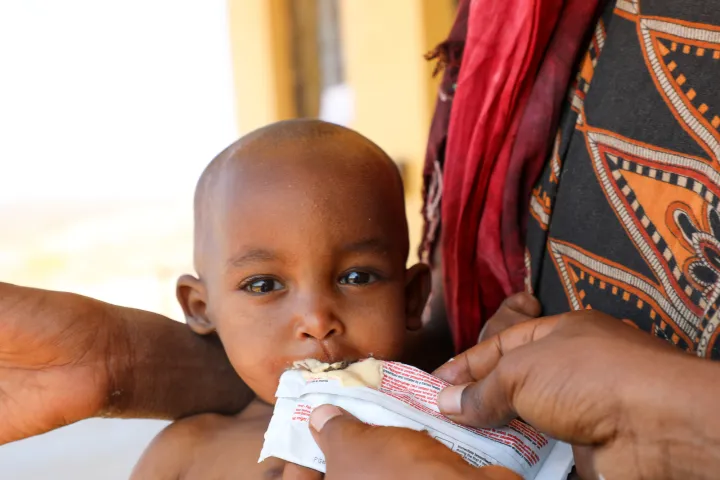 Halimo Hassan (1 year and 2 months) and mother Khayro Ali Hassan (30) in a remote health centre in Filtu, Somali Region where she is receiving emergency food. Photo: Jennifer Nolan/ Concern Worldwide. Halimo Hassan (1 year and 2 months) and mother Khayro Ali Hassan (30) in a remote health centre in Filtu, Somali Region where she is receiving emergency food. Photo: Jennifer Nolan/ Concern Worldwide.
