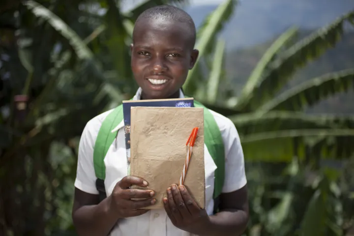 Amida Tuyishimire (14) with her school books and pens. Photo: Abbie Trayler-Smith / Concern Worldwide. Amida Tuyishimire (14) with her school books and pens. Photo: Abbie Trayler-Smith / Concern Worldwide.
