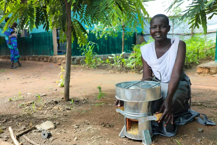 Abamoltho Gudra cooks for her five children using her eco stove in the Pugnido refugee camp in Gambella. Photo: Jennifer Nolan / Concern Worldwide. Abamoltho Gudra cooks for her five children using her eco stove in the Pugnido refugee camp in Gambella. Photo: Jennifer Nolan / Concern Worldwide.