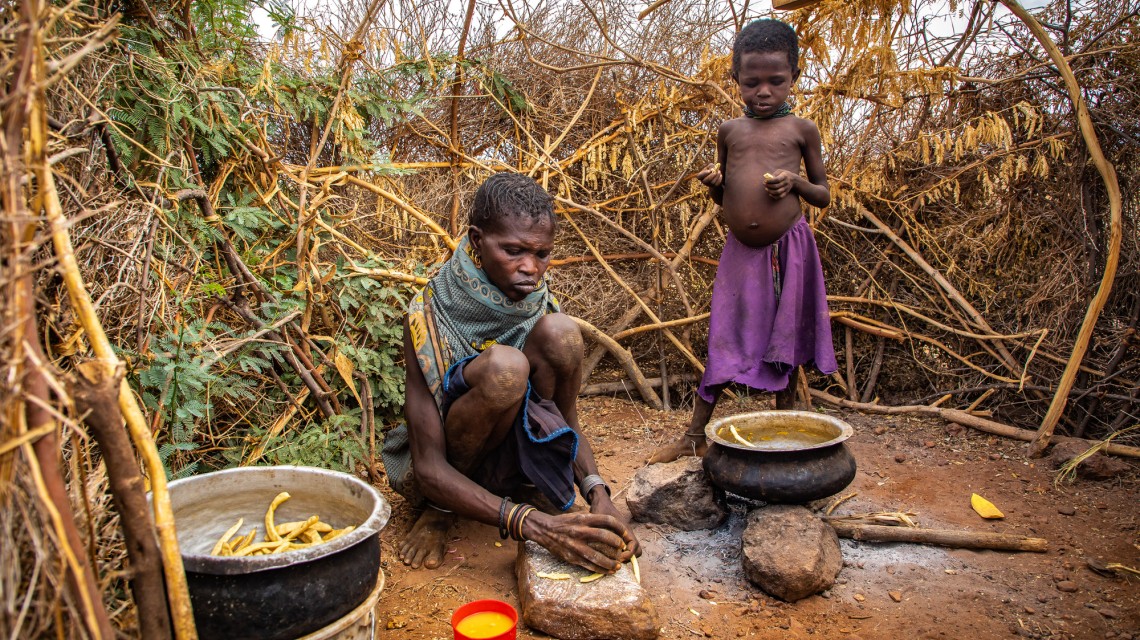 Ng’ikaro prepares the wild fruits that have become her family’s sole source of nutrition during drought in northern Kenya. AS pastures have dried up her herd of goats have been wiped our and the few that remain are no longer able to produce milk. Photo: Gavin Douglas / Concern Worldwide.