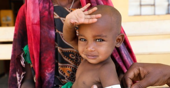 Halimo Hassan (1 year and 2 months) and mother Khayro Ali Hassan (30) in a remote health centre in Filtu, Somali Region. Halimo is being treated for severe acute malnutrition with the support of International NGO Concern Worldwide. Photo: Jennifer Nolan/ Concern Worldwide.