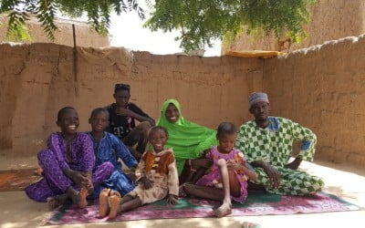 Ibrahim Abdou, a member of the Husbands Schools, with his family. Photo: Ciara Hogan / Concern Worldwide.