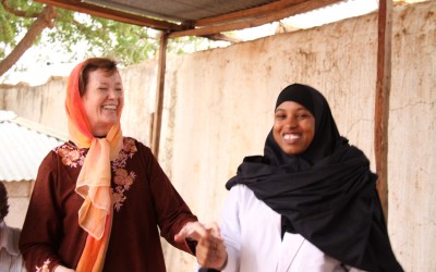 Mary Robinson with healthworker Nadhifa Ibrahim Mohamed. She has worked in Dollow Health Centre for 3 years and is a certified midwife, Dollow, Somalia. The Somali district of Dollow is situated on the Somali / Ethiopian border. Dollow town, the district capital, is the border crossing point and is contiguous with Dollow Ado on the Ethiopian side. Dollow is a key transit point between Somalia and Ethiopia in the current crisis with over 1,700 crossing between the two countries on a daily basis. To date 7