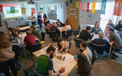 Concern staff members participate in Project Us Café run by students participating in the Concern TY Academy. Photo: Gavin Douglas/ Concern Worldwide.