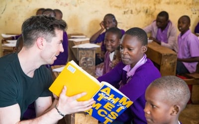Dublin GAA Player, Michael Darragh Macauley working with students during a lesson in M.M Chandaria school in Nairobi, Kenya. Picture: Steve De Neef / Concern Worldwide.