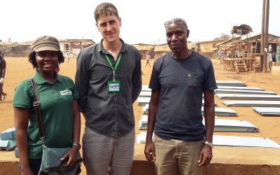 Residents rebuild their homes at the Kroo Bay slum.