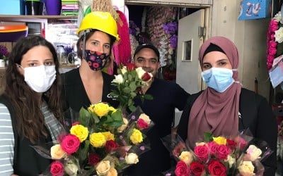 Concern staff Amani, Pauline and Sanaa buying flowers to distribute alongside the dignity and shelter kits to support the local community affected by the Beirut blast.Lebanon Photo: Pauline Coste / Concern Worldwide