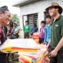 Concern Worldwide's Dom Hunt distributes tarps in Mane Banjang, a community high in the foothills in Sindhupalchok district, one of the hardest hit areas by the 7.8-magnitude earthquake that struck Nepal on April 25th. Concern Worldwide and Rural Reconstruction Nepal (RRN) distributed shelter and relief items to 832 households on May 15th in four areas. Photo: Crystal Wells / Concern Worldwide