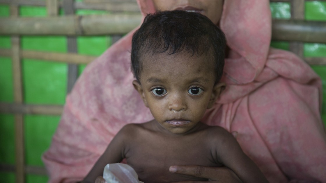 Layru (25) and Hala (2) at Concern Worldwide's Nutrition Support Centre at Hakim Para camp in Cox's Bazar, Bangladesh. Photo: Kieran McConville / Concern Worldwide.
