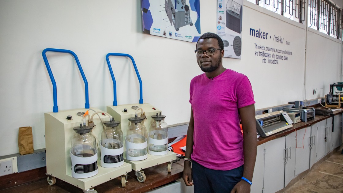 Steve Osumba, a Project Engineer at Maker Space, explaining their suction machine design process.