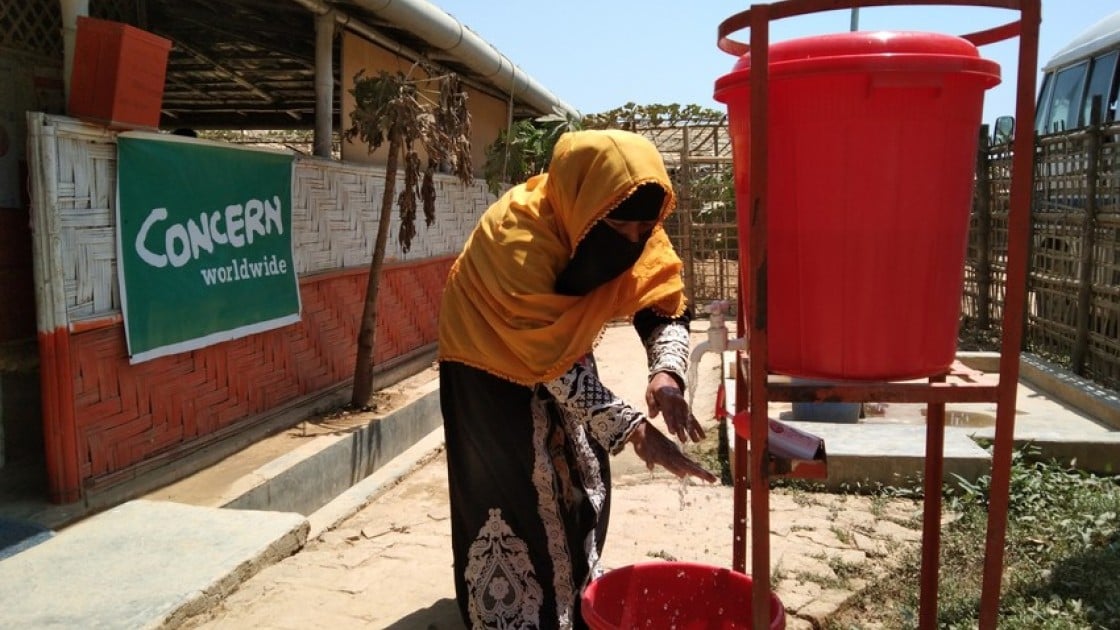 Kona, a Concern programme participant, washing her hands as a preventative measure to the spread of COVID-19