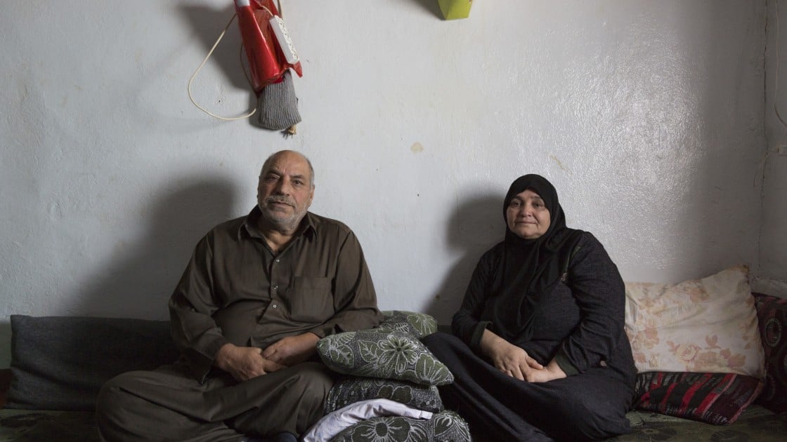 Khaled and Fatima, Syrian refugees, in their home in Lebanon