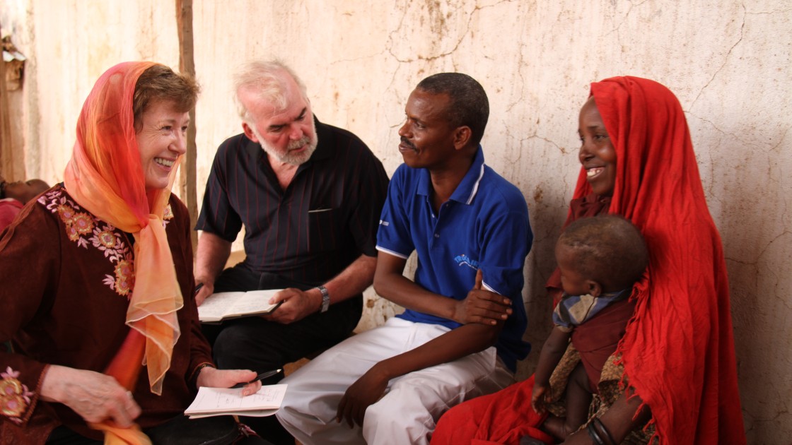 Former Irish president, Mary Robinson and former Concern CEO,Tom Arnold, meet Barey Mohamed Abdirahman and four-year old Farhiya Adbi Billow at Dollow Health Centre, Somalia. Photo: Jennifer Nolan, Somalia, 2010.