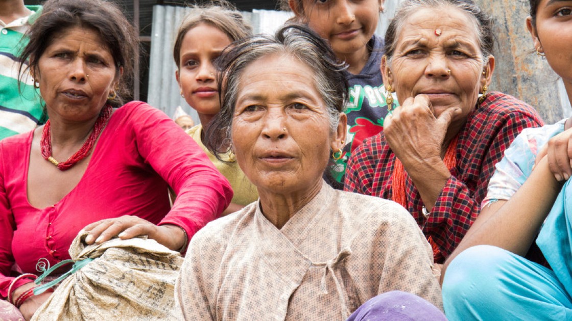 Laxmi Aryal packs up the items she received at a Concern WorldWide distribution in Talamarang in Sindhupalchok district, one of the hardest hit areas by the 7.8-magnitude earthquake that struck Nepal on 25 April. Photo taken by Crystal Wells / Concern Worldwide.