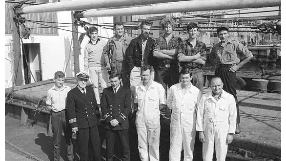 The Crew of the Columcille Top L-R Kevin Edwards (Cook), Nickey Beggs (Bosun), Ollie Harwick (2nd Mate), John McGrath (AB), Brian Byrne (AB), Tony O’Moore (AB) Bottom L-R Karl Vekins ( Catering Boy), Padraig O’Shea (Captain), Niall Foley (1st Mate), Fr. Joe Fitzgibbons (3rd engineer), Peter Shortall (2nd engineer), Kevin O’Reilly (Chief engineer). Photo: Concern Worldwide