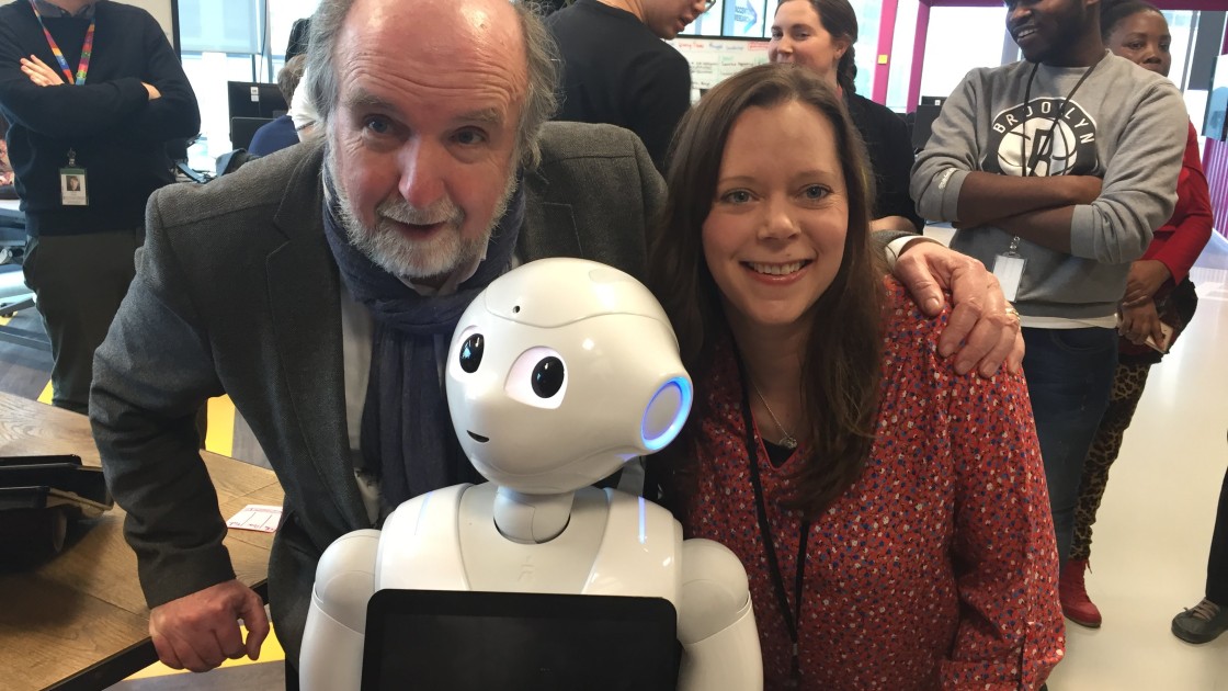 Michael Doorly and Ellen Ward of Concern meeting Pepper the Robot in Accenture's Dock building in Dublin. Photo: Concern Worldwide