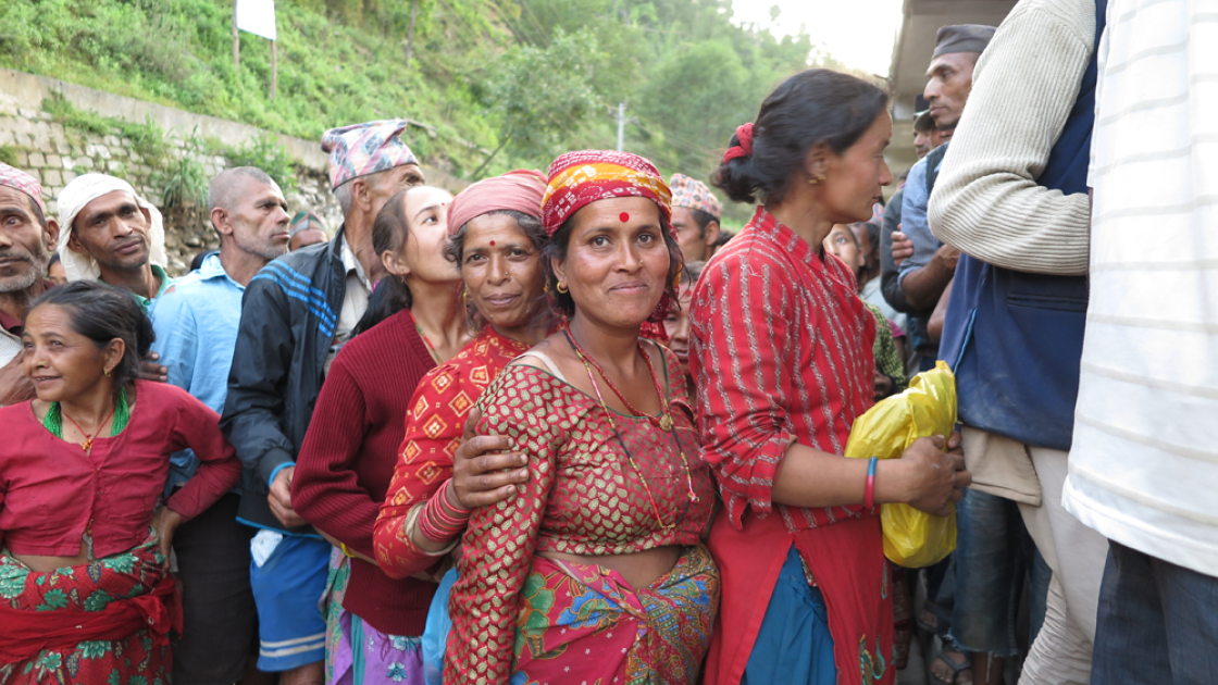 Villagers queue for relief items in the Sindhupalchok District. Photo taken by Andrea Barrueto.