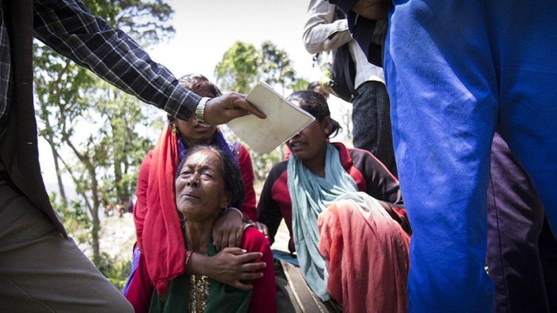 A woman sobs after a major earthquake rocked Nepal on Tuesday 12 May near Bhirkot in Dolakha district. Photo taken by Crystal Wells / Concern Worldwide.