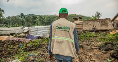 Concern staff member surveys latrine construction in DRC