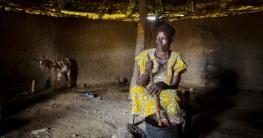 Woman at her home in South Sudan