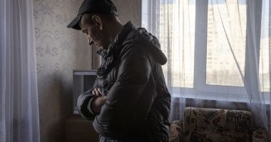 A man looks at the damage in his flat in north eastern Kharkiv due to conflict in the region. (Photo: Ed Ram/Concern Worldwide)