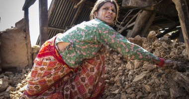 Tulasa Aryal, 58, tries to salvage what she can from her earthquake-ravaged home in Bakrang, a village near the epicenter of the earthquake. A roughly hour drive from Gorkha, Bakrang was among the hardest hit villages in the 7.8-magnitude earthquake that hit Nepal on April 25, 2015. Out of 793 houses homes in Bakrang, 515 were completely destroyed. Photo: Crystal Wells/Concern Worldwide