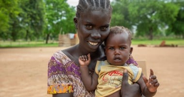 Adut with her daughter Axlam (nine months) at the Lueth Ngor PHCU (Public Health Care Unit) in Aweil North. Photo: Eugene Ikua/Concern Worldwide