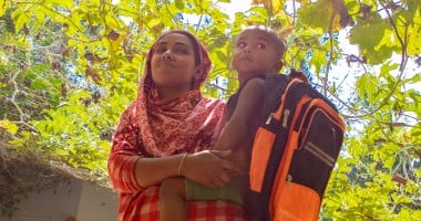 Hosenare Aktar (28) is a mother of 2. She has two sons Sakib (10) and Rakib (2) pictured. Before CRAAIN, Hosenare had never farmed before. Concern gave her training, seeds and goats. Now she has ducks, goats and an abundance of vegetables all because of Concern. She also employs a lot of climate smart agriculture like growing in bags and making compost and growing on elevated terraces. Photo: Gavin Douglas/ Concern Worldwide