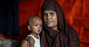 Arshia* (25) with her son Kassim* (15 months)