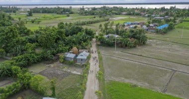 A four-foot-high, 2,241-foot-long flood-resilient road now bridges the east and west of Vati Kapasia, Bangladesh. The raised road, a lifeline for the local community, was constructed in July 2024 by Gana Unnayan Kendra with support from Concern Worldwide and funded by the Z Zurich Foundation”. Photo: Saikat Mojumder/Concern Worldwide