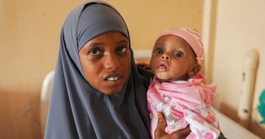 Nuurto* (24) has four children, three girls and one boy Ali* (5 months). Ali* became seriously ill when he was only a few months old. Nuurto* brought him to hospital and discovered he was malnourished. Ali* received treatment and Nuurto* also received cash assistance. Photo: Adnan Mohamed/Concern Worldwide