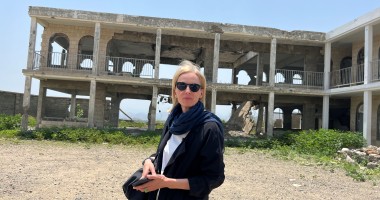 Journalist Orla Guerin standing outside an abandoned building in Taiz, Yemen