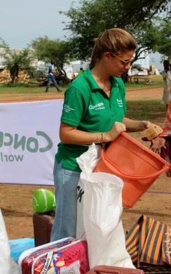 Concern staff member assisting Sudanese refugees at Chad border