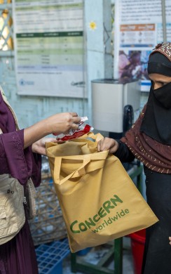 Kulsum* visits the Concern nutrition centre with her fourth child (15 months) for a health examination and to receive ready-to-use therapeutic food. (Photo: Saikat Mojumder/Concern Worldwide)