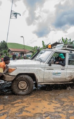 A Concern car gets stuck in mud while trying to reach displaced communities in Democratic Republic of Congo