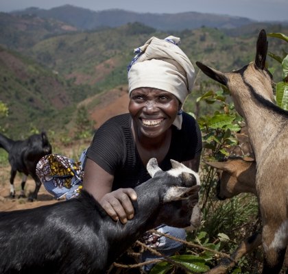 Meresiyana Cimpaye (40) with the goats she bought from the profits of her Graduation Programme cash transfer. Photo: Abbie Trayler-Smith / Concern Worldwide.