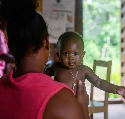 Marie Christina Kargpo with baby Francis at Bundulai Maternal Child Health Post