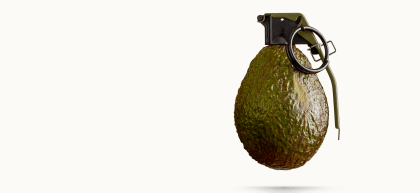 Avocado with grenade pin attached