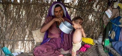 Jamna feeding her daughter Shanti 