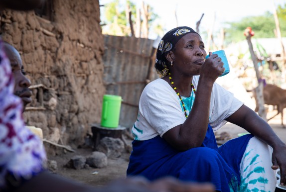 Mwanajuma Ghamaharo eats breakfast at her home in Makere village in Tana River County. She participated in Concern and ADM's LEAF Project. As a result, her county didn't need emergency food aid for the first time in decades. Photo: Lisa Murray/Concern Worldwide