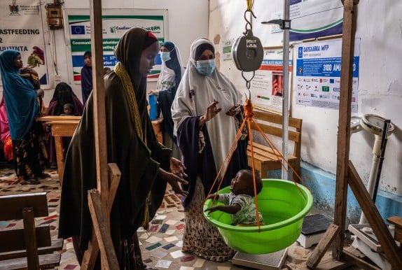 Baby being weighed at health centre in Mogadishu