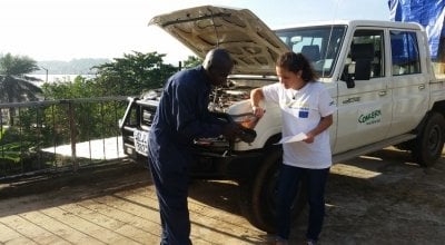 A routine service in Sierra Leone with the Assistant Transport Officer, Samuel Serry, and the EU Aid Volunteer, Anne Vazzoler. Photo: Mohamed Ameen Bah/Concern Worldwide.