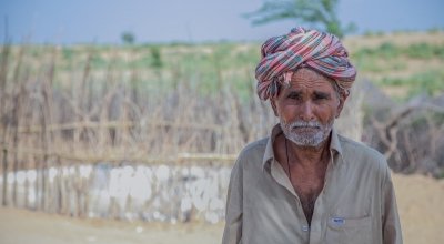 Ghulam Muhammad from Nasirani village, Umerkot, Pakistan stands outside his house. Photo: Black Box Sounds.