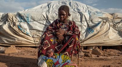 Darifa* (18) with her 10 day old daughter, Lenka*. Both live at an unofficial IDP site in the Centre North region. Photo: Concern Worldwide.  