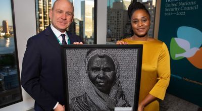 Concern Worldwide Haiti Programme Director, Victoria Jean-Louis, presents a photographic art piece which incorporates over 10,000 signatures for Concern’s Nothing Kills Like Hunger campaign to the Permanent Representative of Ireland to the United Nations, Fergal Mythen,.
