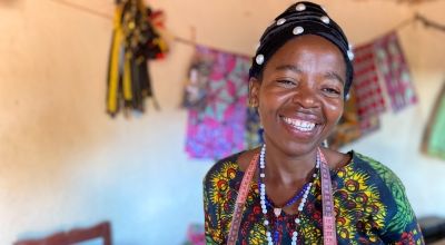Alexia Mukashyaka runs a successful tailoring business in a small workshop in her village, after partnering with Concern.