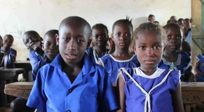 Children studying in a classroom in Sierra Leone