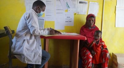 Muad Najib Khalif (4) and his mother Bishaaro Abdulahi Omar attend a malnutrition screening visit at the local health centre in Legahida, Ethiopia. Photo: Conor O'Donovan/Concern Worldwide